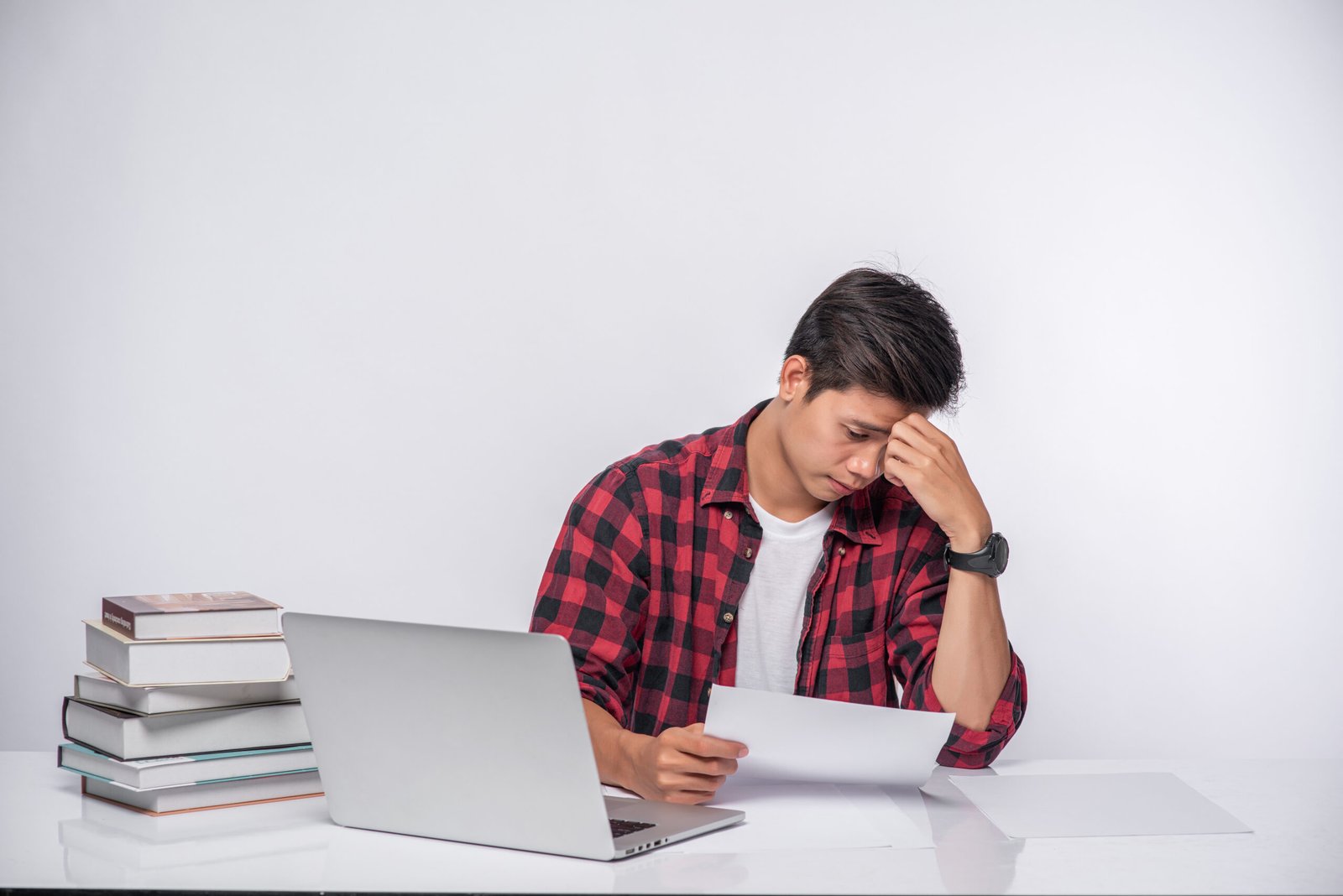 Student struggling while studying to improve grades